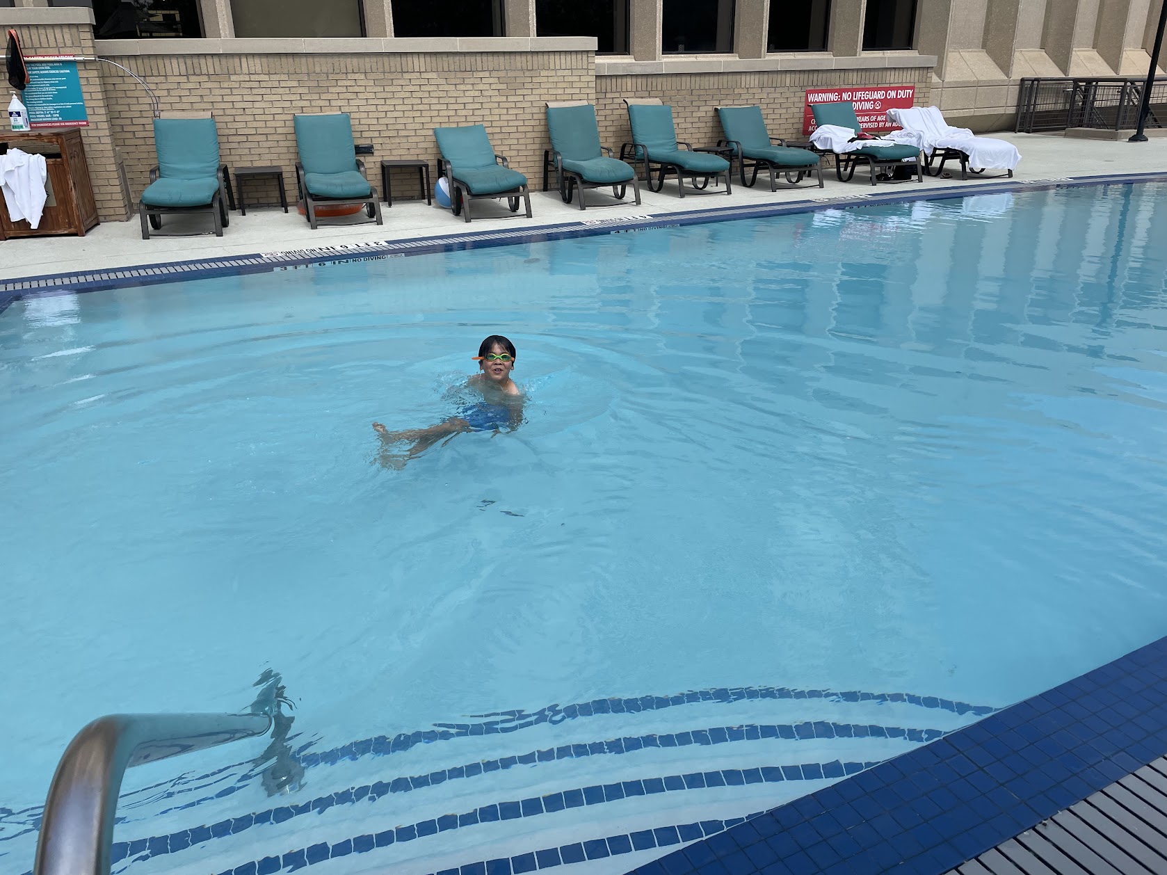 Swimming at our hotel pool